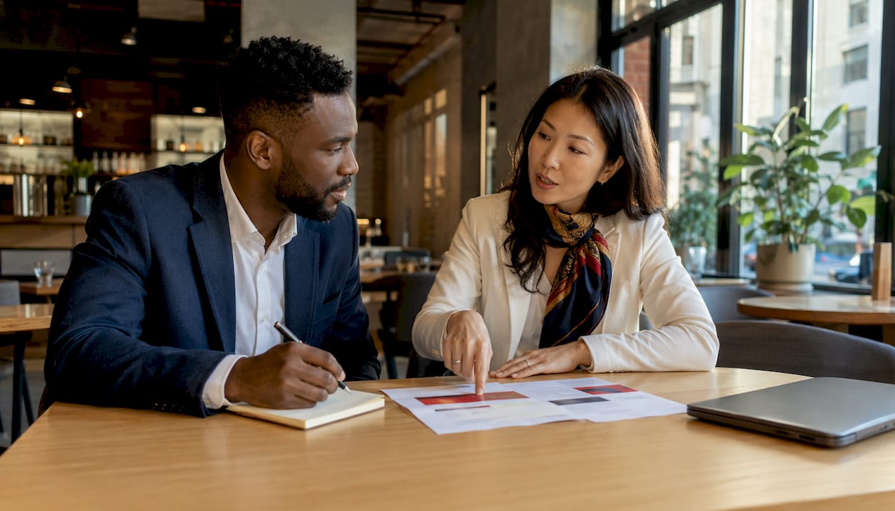 Two marketers consulting on premium pricing