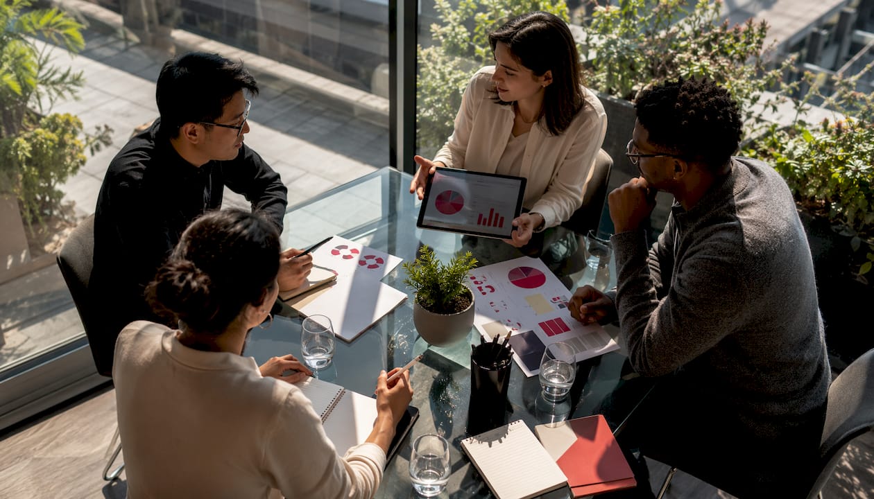 Brand managers collaborating on pricing strategy