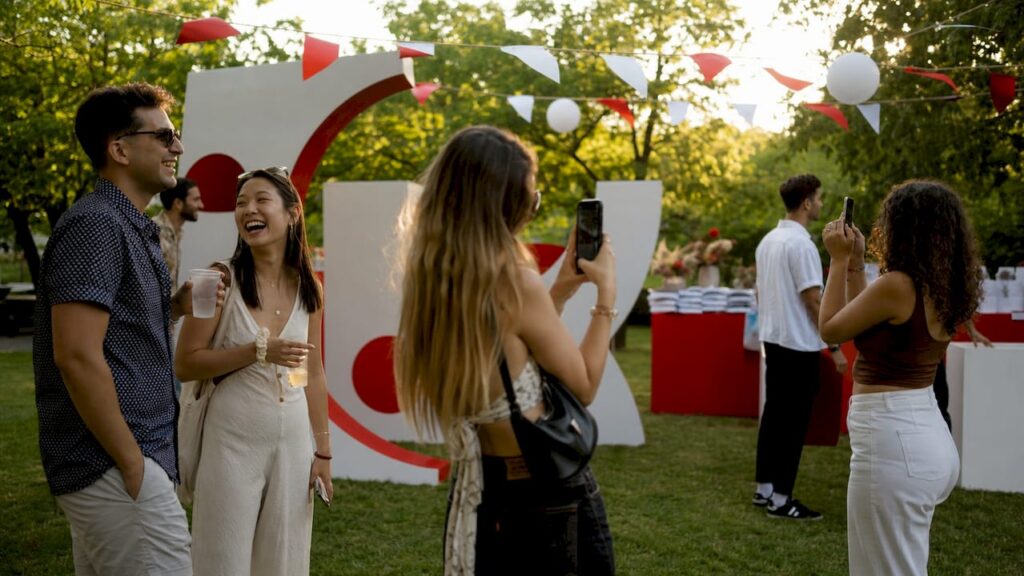Advantages of Experiential Marketing for Brand Growth People engaging at outdoor brand activation event